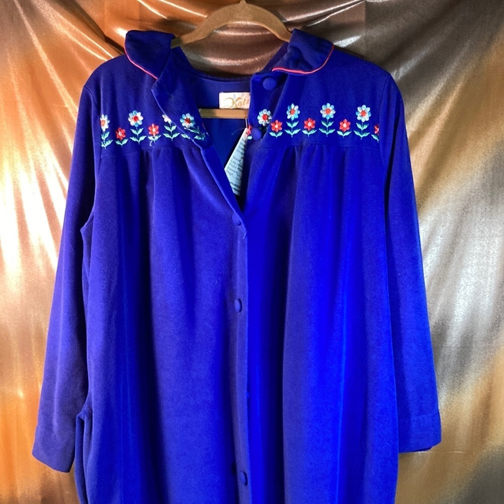 Vintage 80’s blue velour rob with embroidery 50” waist. 50” chest 208